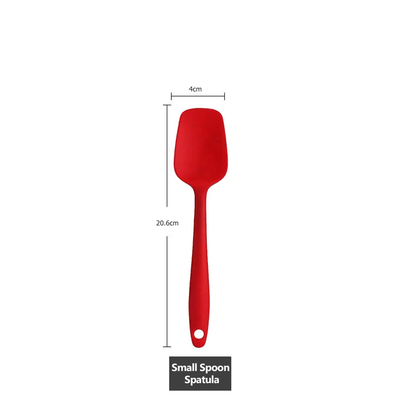 Measurement of a small red silicone spoon spatula, 20.6 cm in length with a 4 cm wide head.