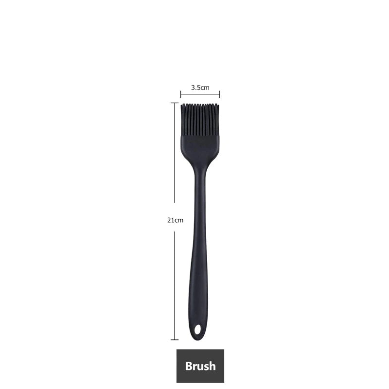 Measurement of a black silicone brush, 21 cm in length with a 3.5 cm wide head.