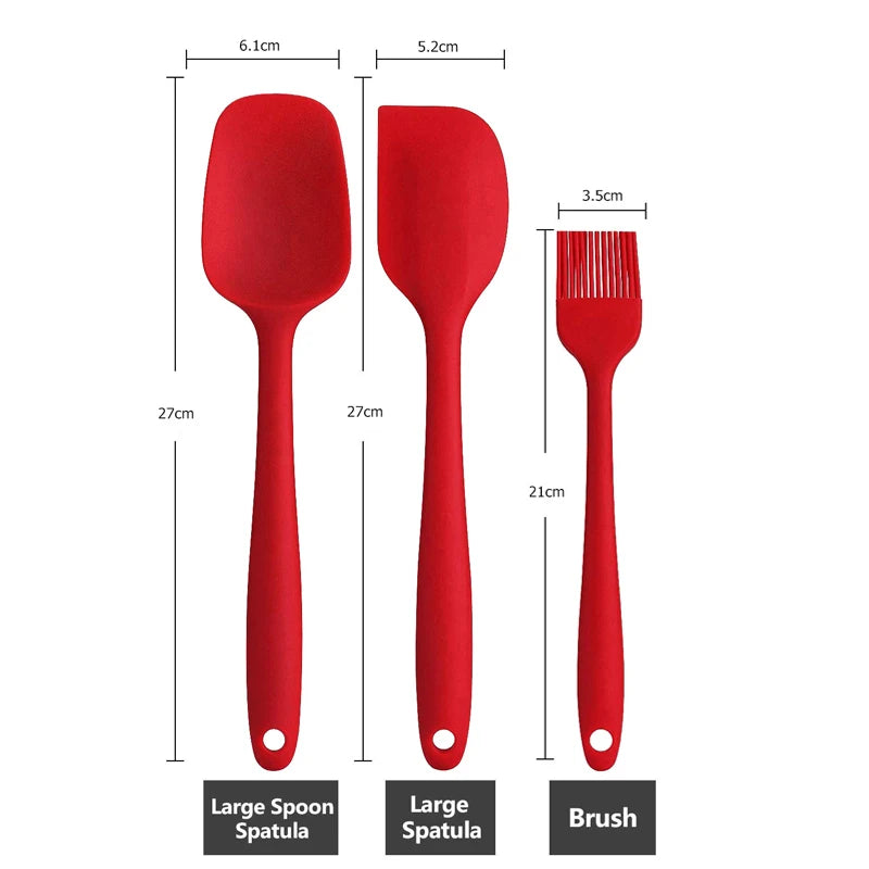 Measurements of large spoon spatula, large spatula, and brush from a red silicone kitchen utensil set.